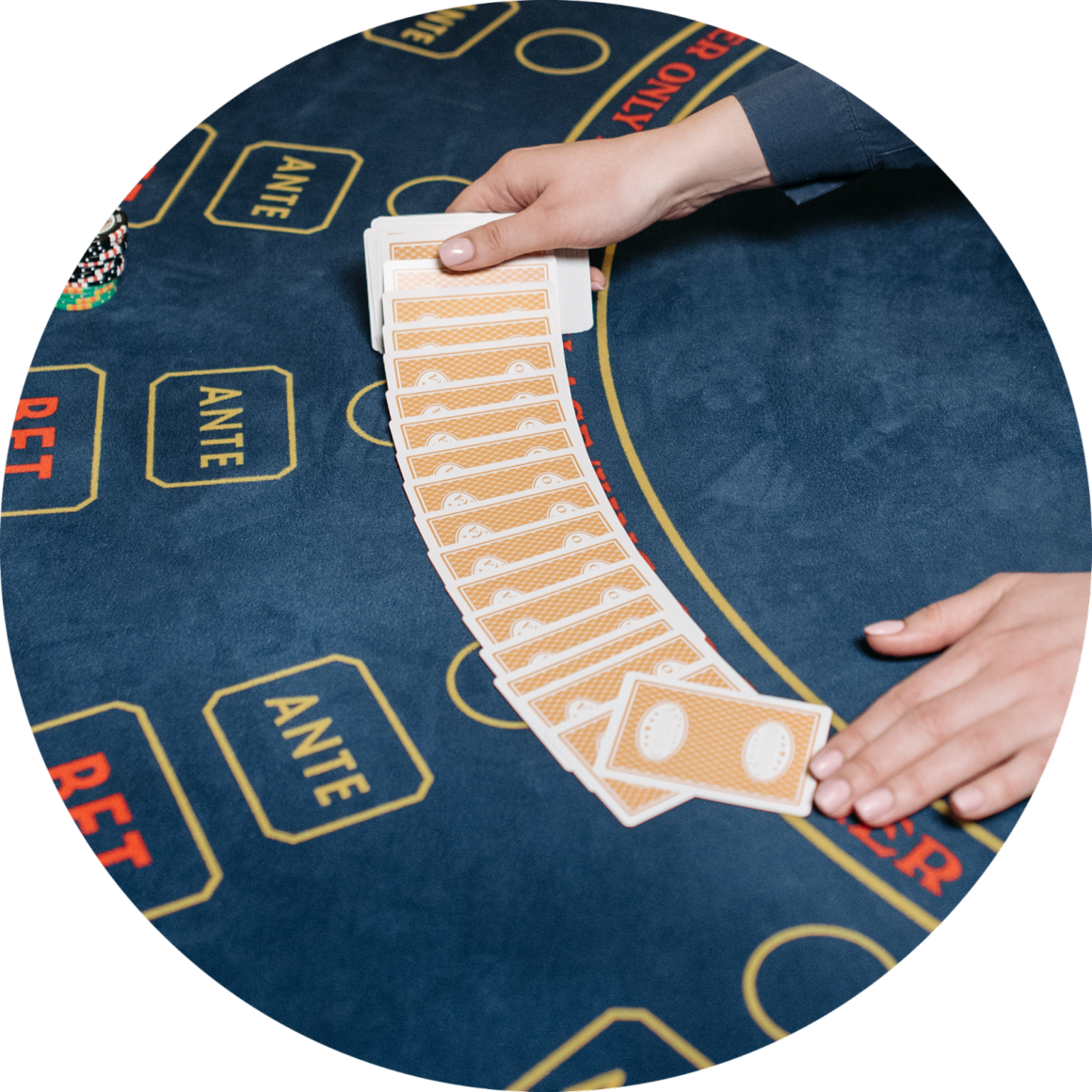 Dealer shuffles cards baccarat table