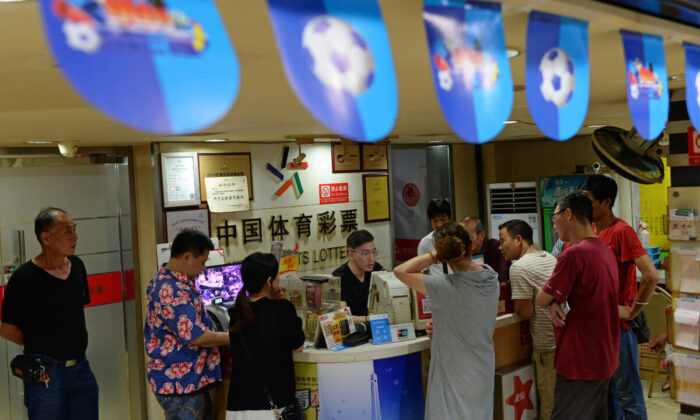 People In Line to Bet on China Sports Lottery