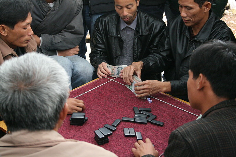Chinese playing Mahjong for entertainment